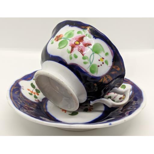 Gaudy Welsh 'columbine' teacup and saucer c 1835