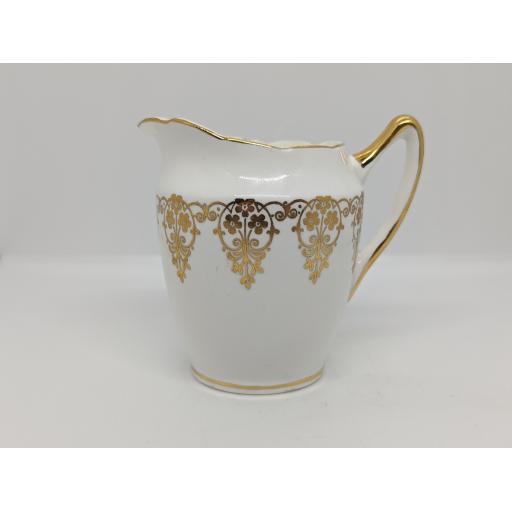 Vintage gold lace milk jug c 1952